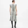 Lumileopardi-neulemekko Lumileopardi-neulemekko