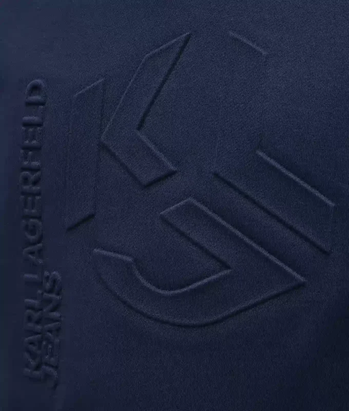 Monogram-kuvioinen collegepaita