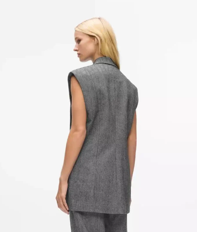 Paljettikoristeltu tweed-liivi Paljettikoristeltu tweed-liivi