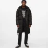 Pitkä untuvatakki Pitkä untuvatakki
