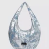 Suuri, kiiltävä denim-hobo-laukku Suuri, kiiltävä denim-hobo-laukku