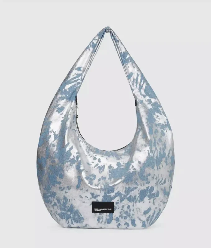 Suuri, kiiltävä denim-hobo-laukku Suuri, kiiltävä denim-hobo-laukku