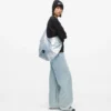 Suuri, kiiltävä denim-hobo-laukku Suuri, kiiltävä denim-hobo-laukku