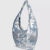 Suuri, kiiltävä denim-hobo-laukku Suuri, kiiltävä denim-hobo-laukku