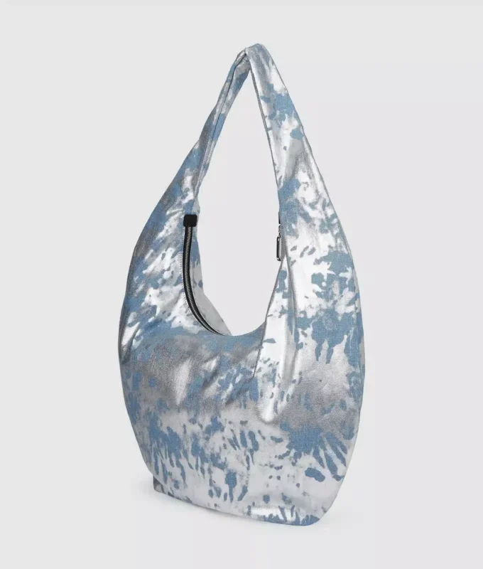 Suuri, kiiltävä denim-hobo-laukku Suuri, kiiltävä denim-hobo-laukku