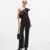 Yhden olkapään jumpsuit